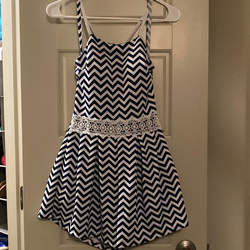 Romper, navy and white chevron pattern with lace like detail in mid section